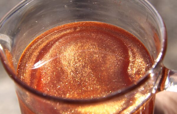 chocolate glow detail Chocolate Glow shimmering body oil